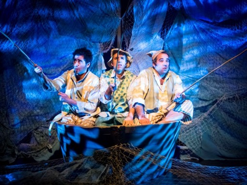 Actor in fish costume with actors around