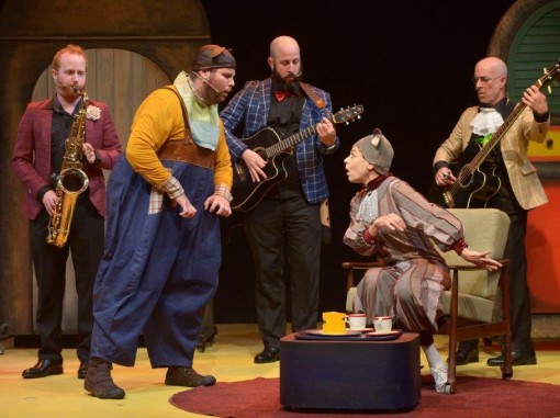 דמויות ההצגה שותות תה ומנגנות